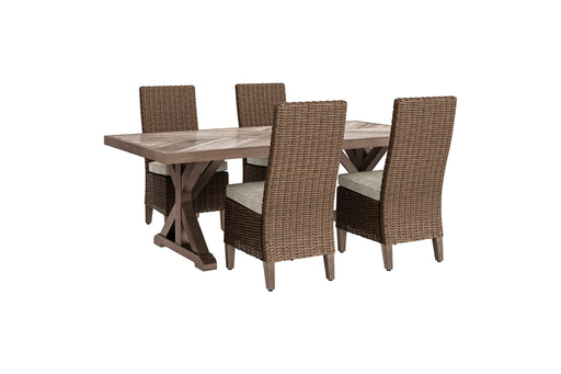 Ashley Furniture Beachcroft outdoor dining set with a rectangular table and six matching chairs on a patio.