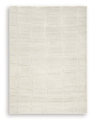 Medium washable area rug by Ashley Furniture featuring a soft, textured design in neutral tones.