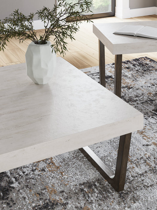 Set of two Westenfort Ashley Furniture 3-pack tables with detailed wood finish and modern design, perfect for living room decor
