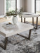 Set of two Westenfort Ashley Furniture 3-pack tables with wooden tops and metal legs, modern accent tables for living room decor.