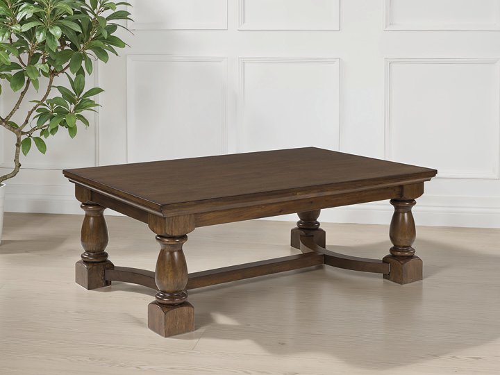 Ashley Furniture Sturlayne coffee table with a wooden top and metal legs, showcased as a stylish cocktail table.