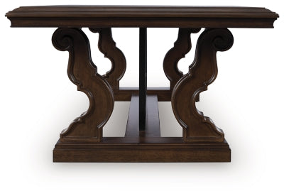 Ashley Furniture Maylee coffee table, cocktail table with a sleek wooden finish and modern design, shown from a side view.