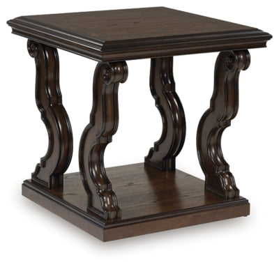 Ashley Furniture Maylee End Table with wood finish, angled design, and modern style shown from a side angle.