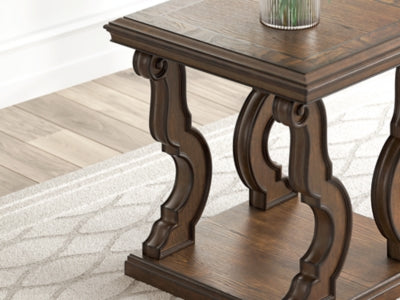 Ashley Furniture Maylee End Table with sleek wooden surface and modern design, shown in close-up detail.