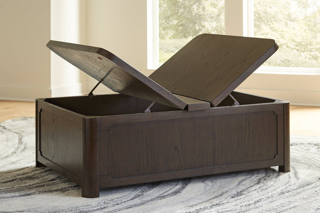 Open view of Ashley Furniture Breckington coffee table with storage, showcasing its sleek design and spacious tabletop.