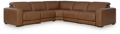 Ashley Furniture Magic Man 5-piece reclining sectional with plush cushions and modern design, shown in a spacious living room setting.
