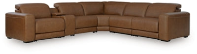 Ashley Furniture Magic Man 5-piece power reclining sectional with plush cushions and modern design, shown in a closed position.
