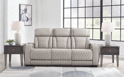 Ashley Furniture Boyington Power Reclining Sofa with plush upholstery and built-in reclining mechanism, shown in closed position.