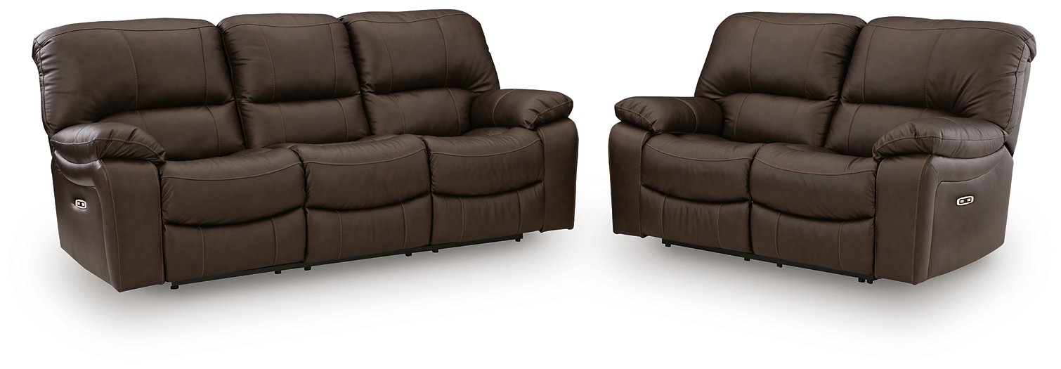 Ashley Furniture Leesworth living room set with a sofa and loveseat, featuring plush cushions and neutral fabric upholstery.