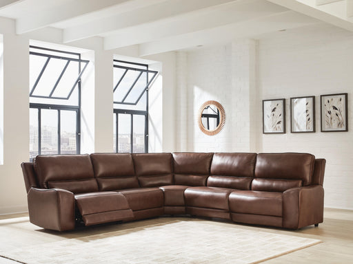 DeepWakes Power Reclining Sectional sofa by Ashley Furniture, featuring plush cushions and multiple reclining seats.