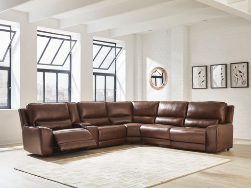 Ashley Furniture DeepWakes reclining sectional with storage console, featuring plush cushions and modern design.