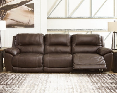 Ashley Furniture Dunleith Power Reclining Sectional Sofa with plush cushions and reclining seats, shown in a modern living room setting.