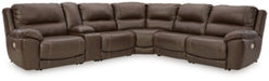 Ashley Furniture Dunleith power reclining sectional shown in a cozy living room with plush fabric and multiple recliner seats.