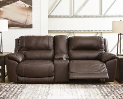 Ashley Furniture Dunleith power reclining sectional loveseat with console, featuring plush upholstery and built-in cup holders.