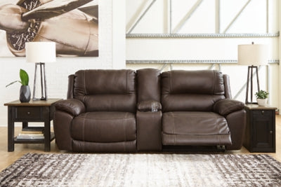 Ashley Furniture Dunleith power reclining sectional loveseat with console, featuring plush upholstery and built-in cup holders.
