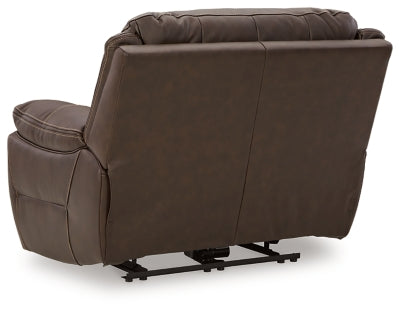 Ashley Furniture Dunleith Power Recliner showing the back view with plush upholstery and built-in reclining mechanism.